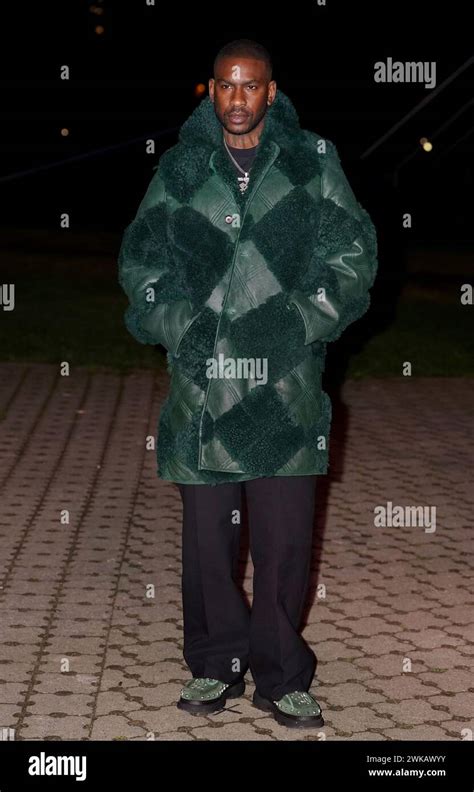 Skepta attends the Burberry show during London Fashion Week 